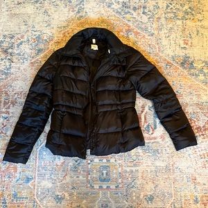 Black down puffer jacket with fleece lined pockets